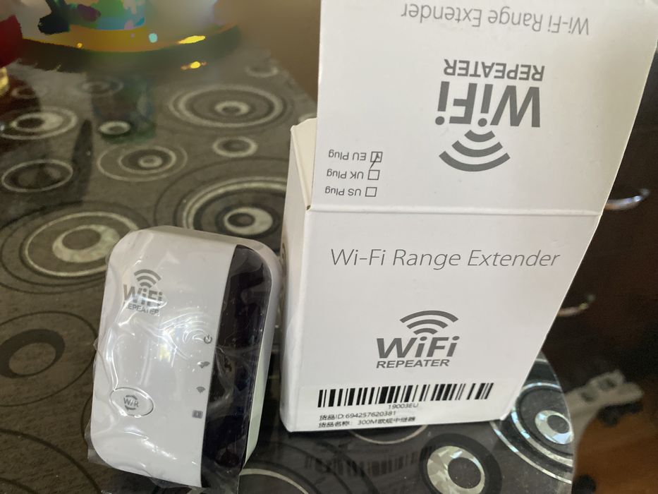 WiFi усилитель сигнала в розетку