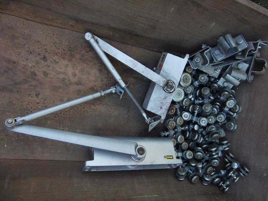 Molas e carrinhos para portas de correr em calhas de 30mm