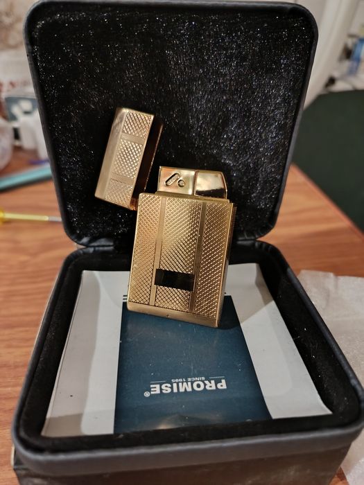 Запальничка зажигалка  Promise 300 грн