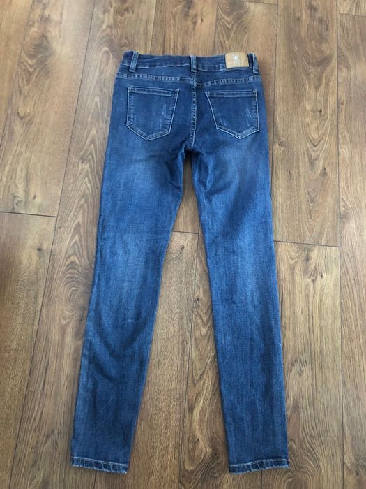 Jeansy skinny z ozdobną aplikacją