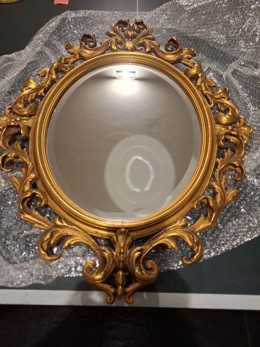 Espelho oval moldura dourada