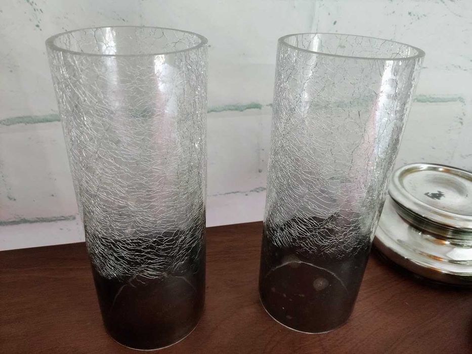 Par de porta velas em vidro e metal