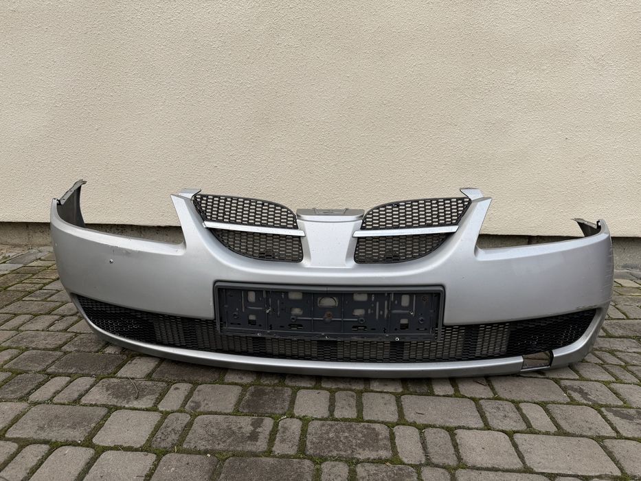 Передній бампер Nissan Almera N16