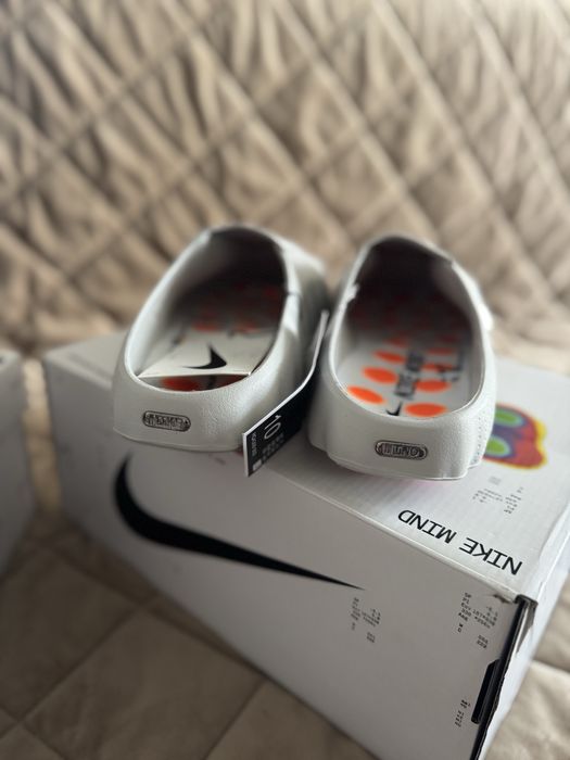 Тапки Nike mind 001