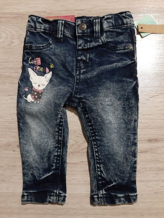 Spodnie dżinsy rol. 74 nowe