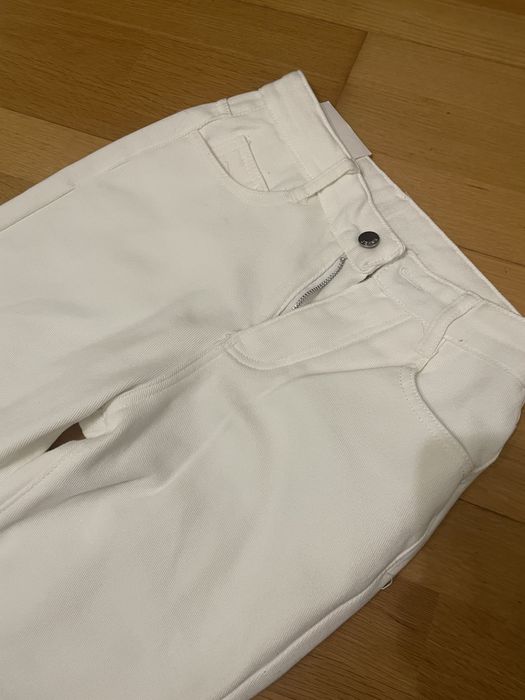 Джинси кльош білі