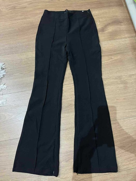 Spodnie damskie czarne dzwony r.m nowe z metką