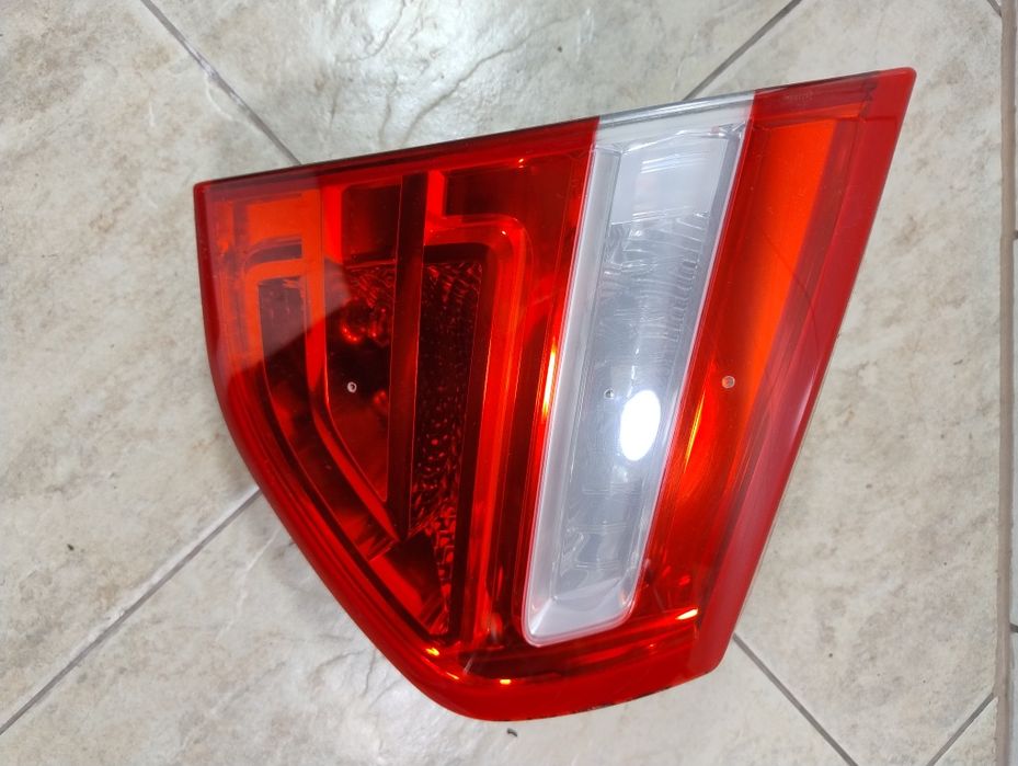 Citroen C4 Picasso lampa lewy tył wysyłka OLX wkład w klapę