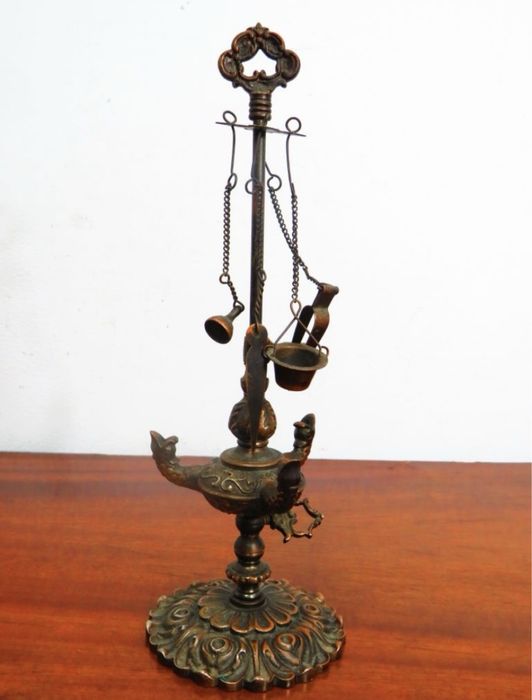 Lamparina de azeite.