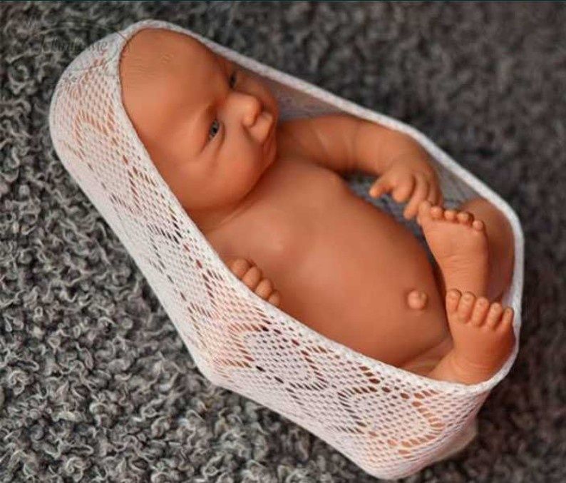 Gotowy kokon z koronki sesja foto