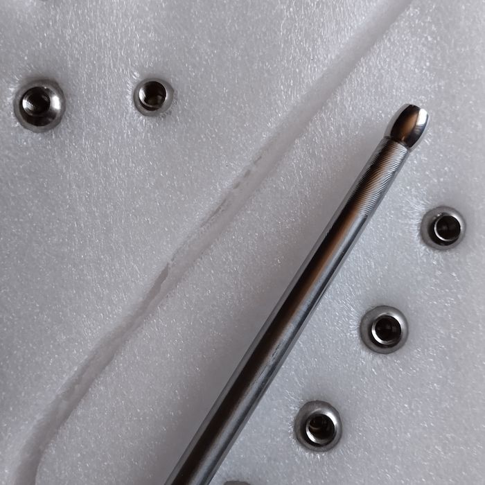 Инструмент для выравнивания вмятин на саксофоне.