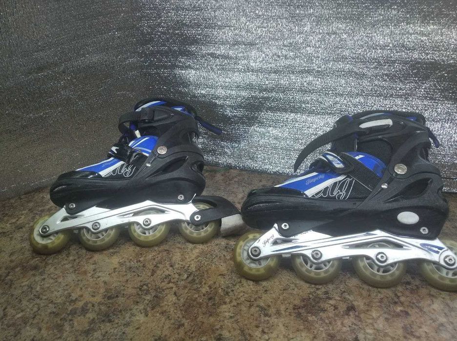 Роликовые коньки