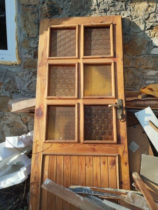 Drzwi drewniane z szybami