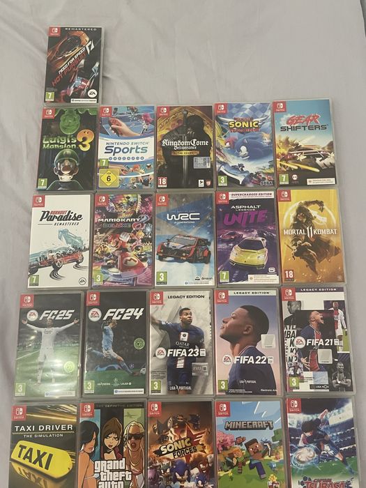 Nitendo swith completa  + 20 jogos + comandos e acessórios - 160€ negociaveis