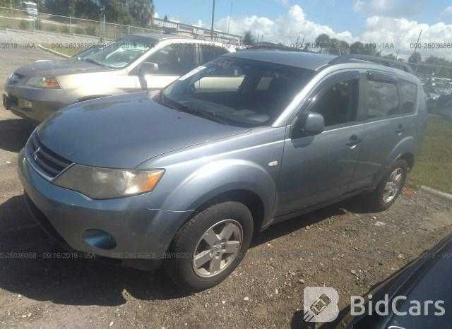 Разборка шрот запчасти MITSUBISHI  OUTLANDER / фара капот бампер дверь