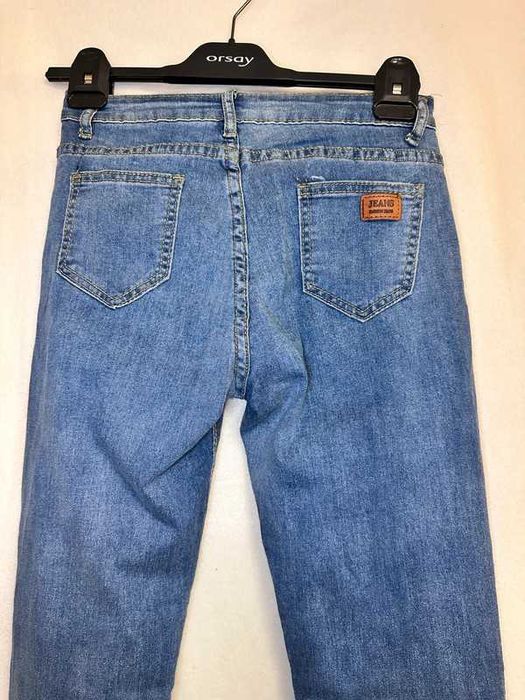 jeansowe spodnie rurki z wysokim stanem