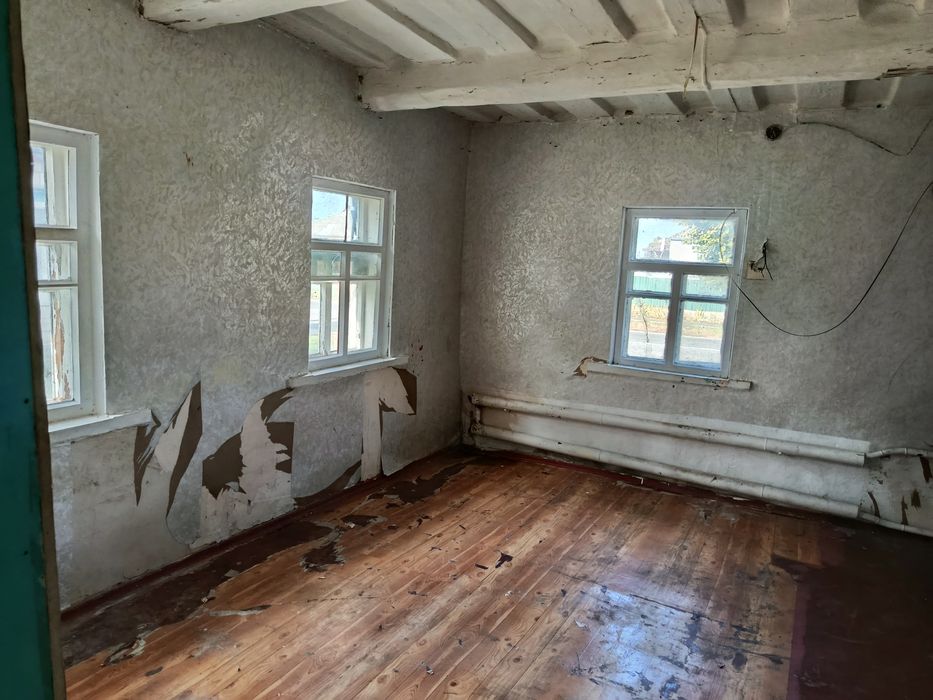 Продам територію з будинком