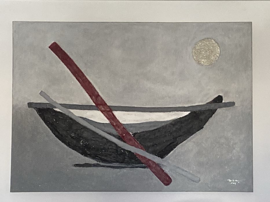 Barco abandonado na areia