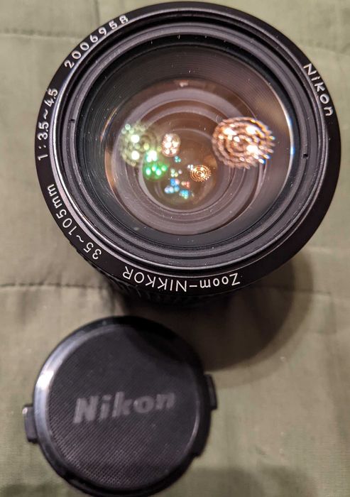 Об'єктив Nikkor-zoom  для фотокамер Nikon вінтаж монуал