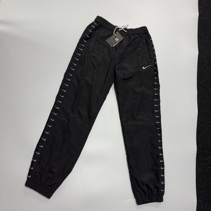 штани спортивні Nike S джогери Найк С - чорний колір нейлонові Лампаси