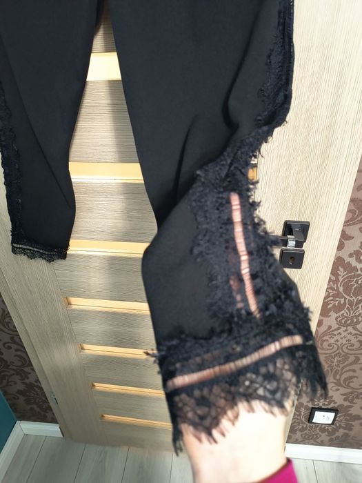 Spodnie Reserved 38 z koronką na boku i dole