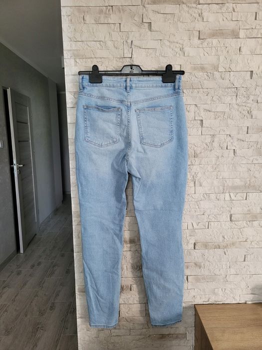 Nowe jasno niebieskie spodnie straight jeans wysoki stan rurki H&M L