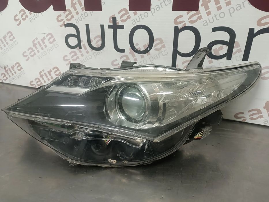 ÓTICA / FAROL TOYOTA AURIS E18 ESQUERDO 2013 - 2014 - 2015 REF. 89907727 81150-02E21