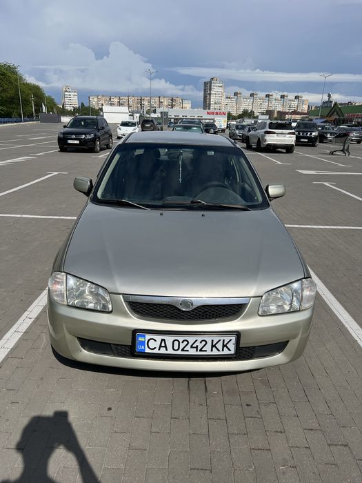Мазда 323