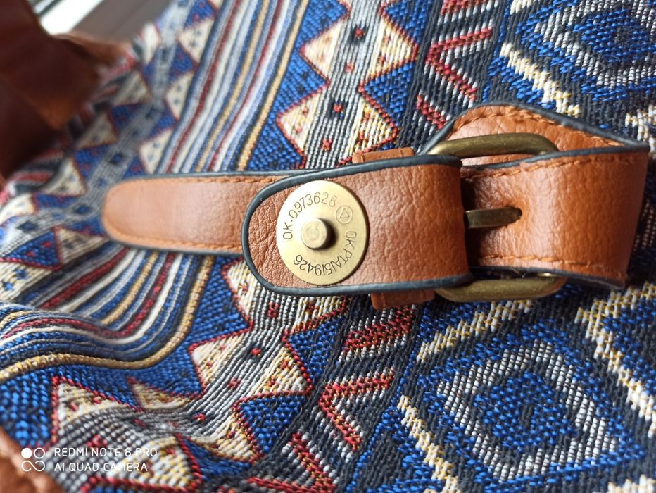 Продам женский рюкзак из текстиля.