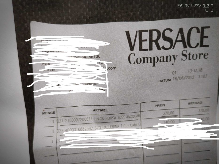 Orginalna  torebka -kuferek  Versace do reki .