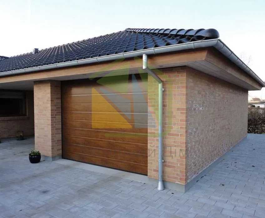 Секційні побутові ворота. Секционные гаражные ворота