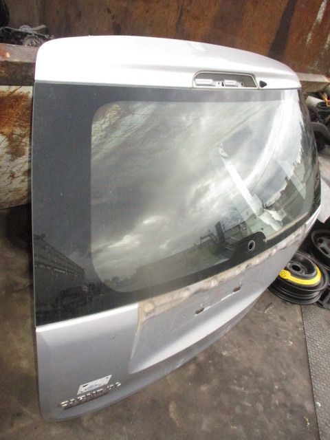 Porta / tampa da mala KIA Carnival / Grand Carnival III (VQ)