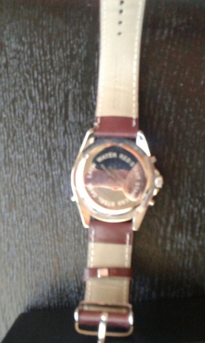 Relógio marca P de M