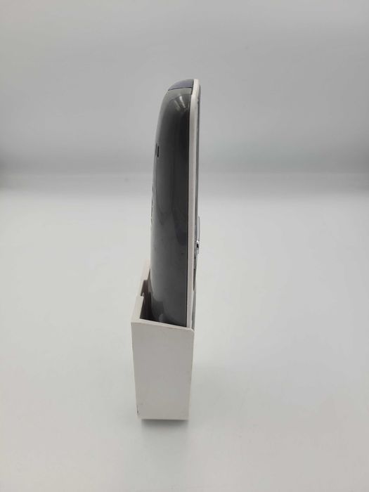 Uchwyt ścienny do pilota Sinclair biały