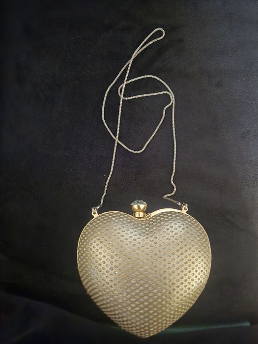 Mala coração dourado