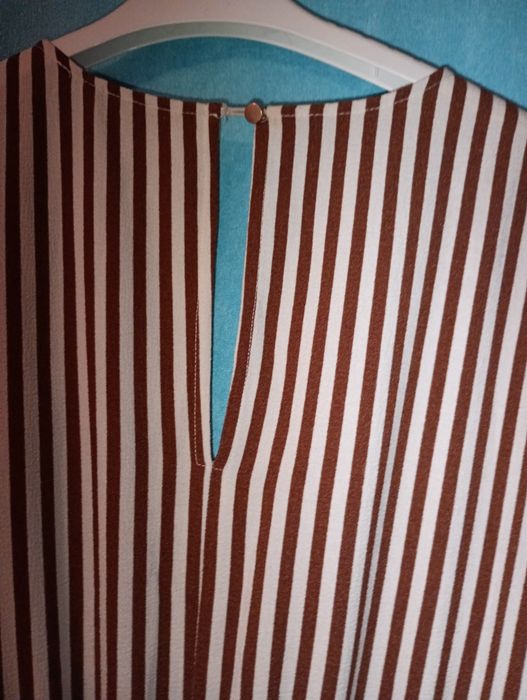 Kremowo-brązowe kombinezon