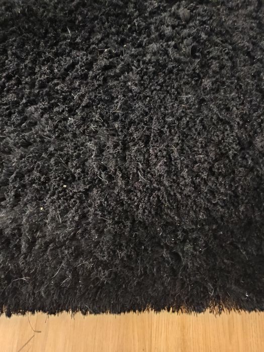 Tapete preto felpudo