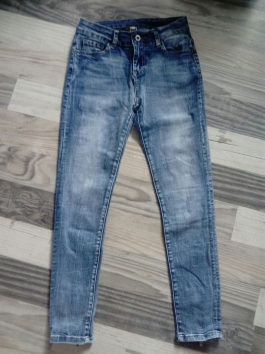 Spodnie z kokardkami nowe z metką