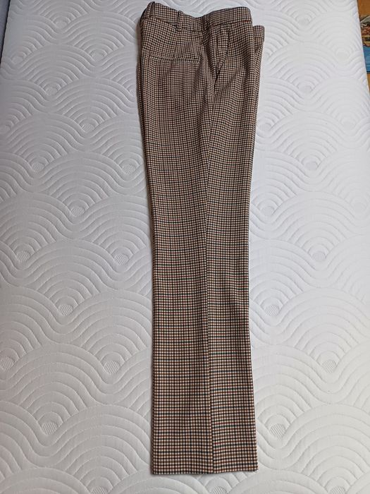 Eleganckie spodnie marki Mango rozm. 34