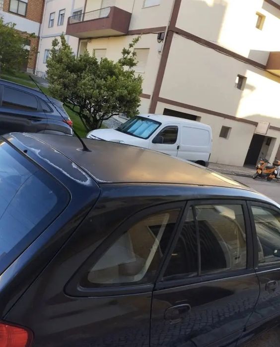 Vendo Mazda 323F com inspeção feita recentemente, feita em setembro de 2026.