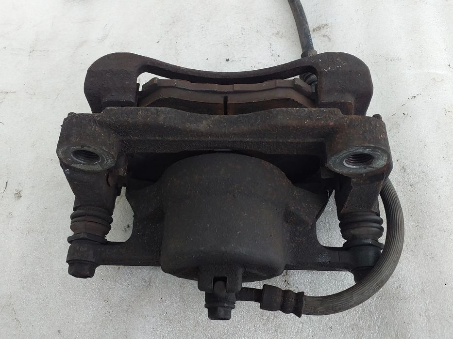 Pinça travão / maxila de travão frente esquerda NISSAN Qashqai/Qashqai