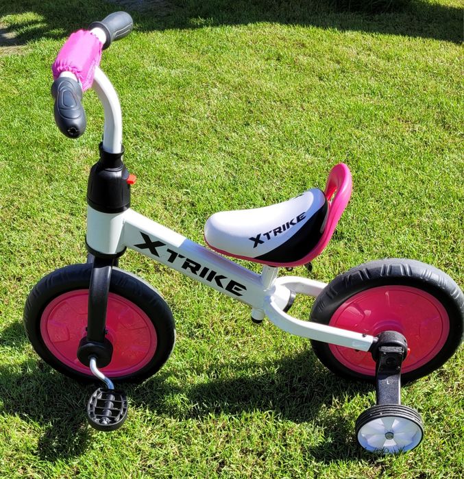 Rowerek biegowy z doczepianymi pedełami różowo-biały