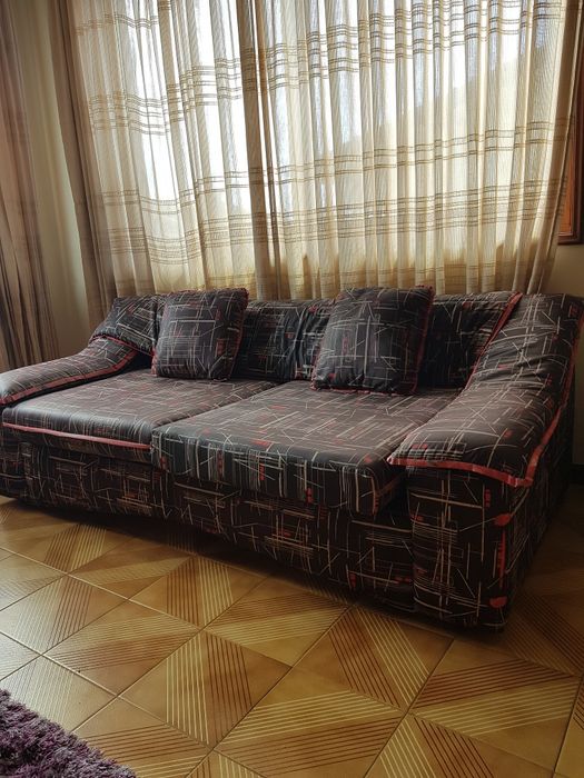 2 Sofás com almofadas