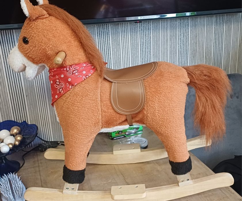 Коник гойдалка музикальний