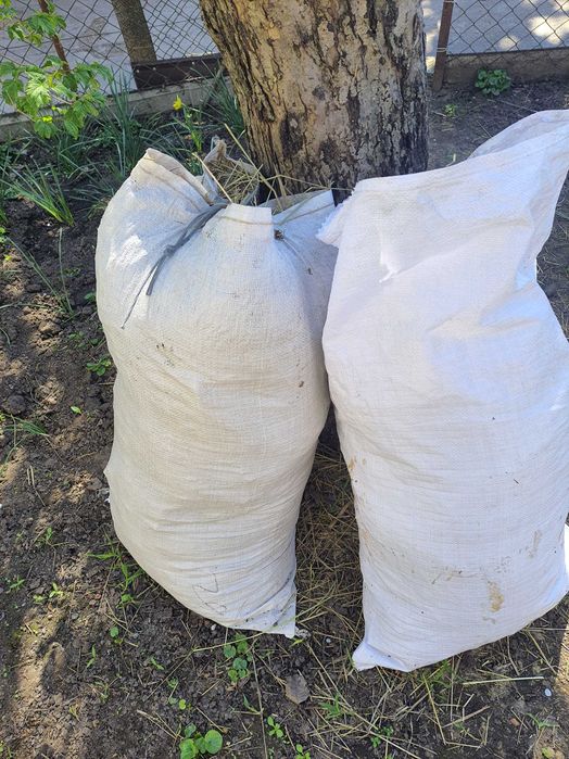 Сено в мешках на мульчу