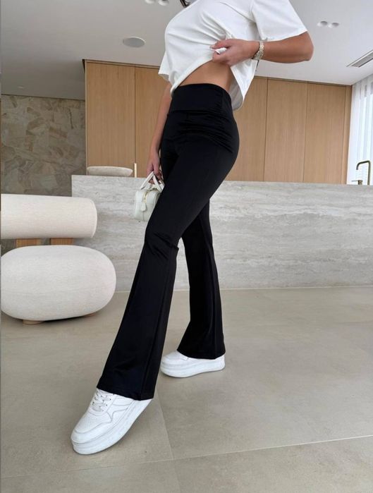 Жіночі брюки кльош