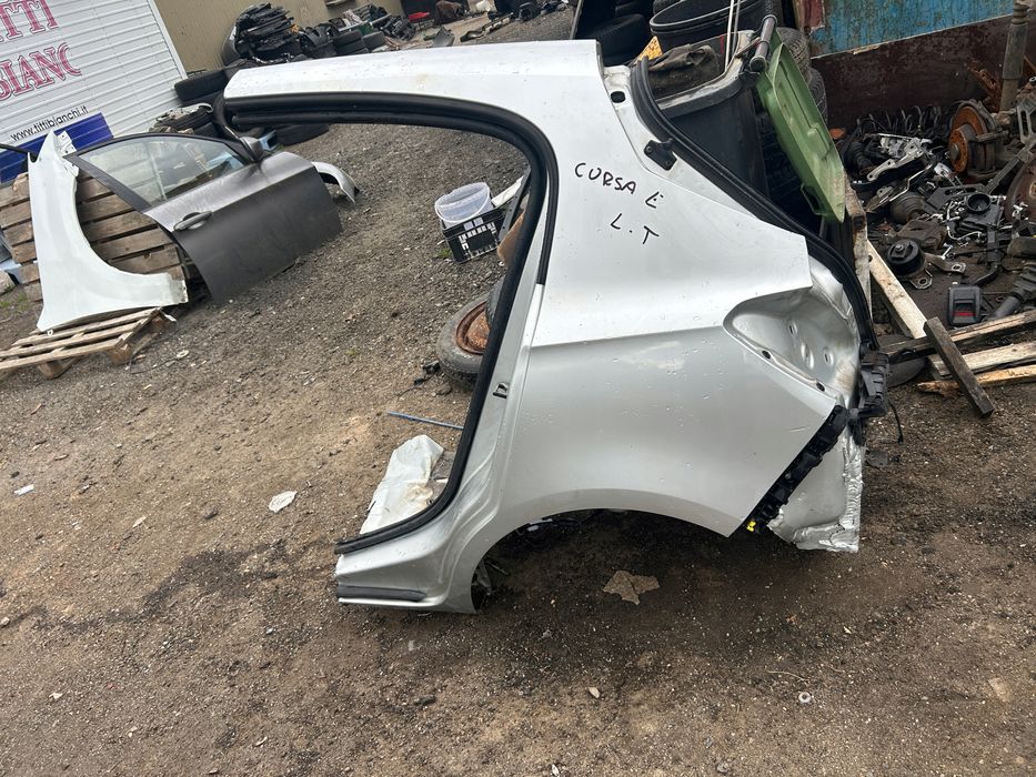 opel corsa e 5 drzwi błotnik tylny lewy
