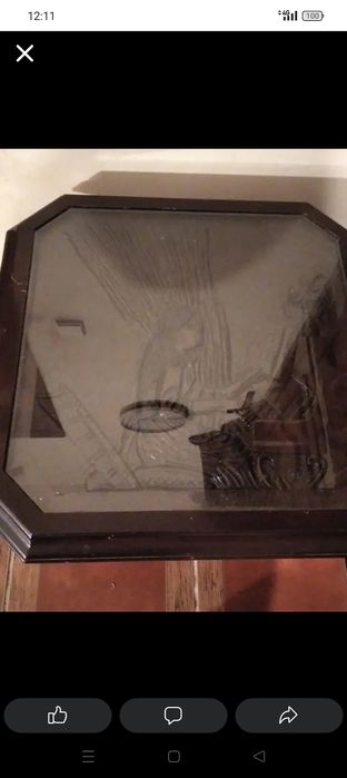 Vendo mesa de centro em castanho nova mesmo.