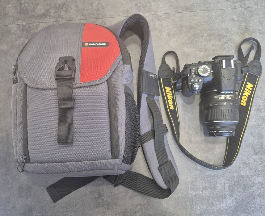 Продам дзеркальний фотоапарат Nikon D3100 + 18–55 мм + рюкзак Vanguard