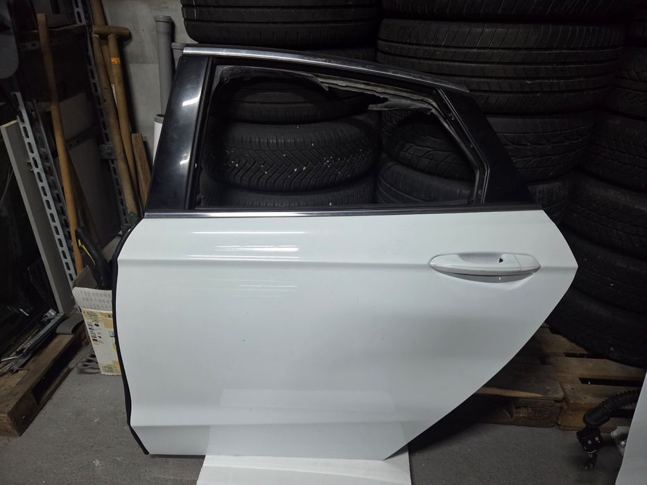 Białe drzwi lewy tył Ford Mondeo MK5 Lift